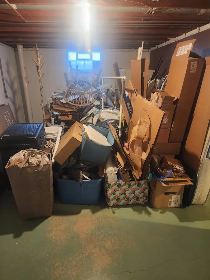 Roll-off dumpster container at job site for 4 Yard Dumpster Rental in Smyrna